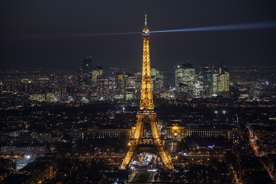 View of the Eiffel Tower all lit up at night