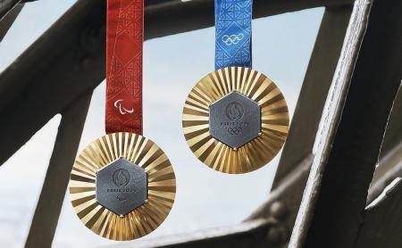 Photo of an Olympic medal and a Paralympic medal