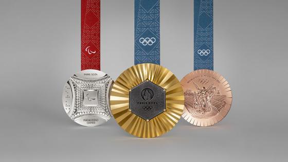 Photo of the various sides of the Olympic and Paralympic medals